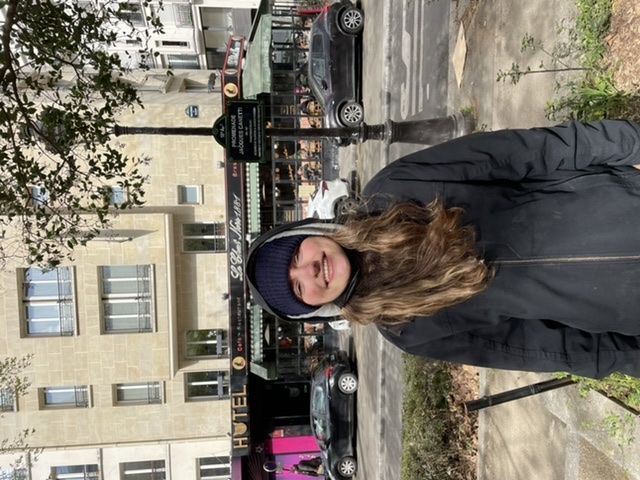 Allison in front of Back Cat Cafe